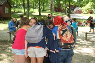 Summer Camp USA Camp Counselor hug