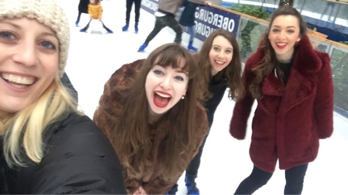 family ice skating xmas